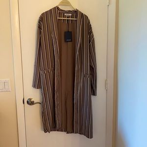 Loose duster. Unworn with tags